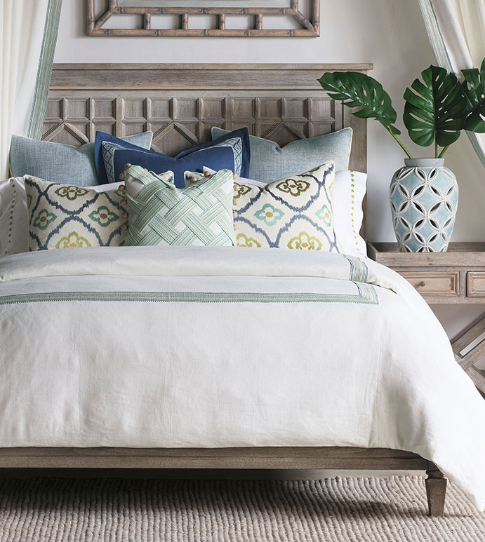 Simple bedding for a guest bedroom in your coastal home. Colors from Benjamin Moores latest color palette.