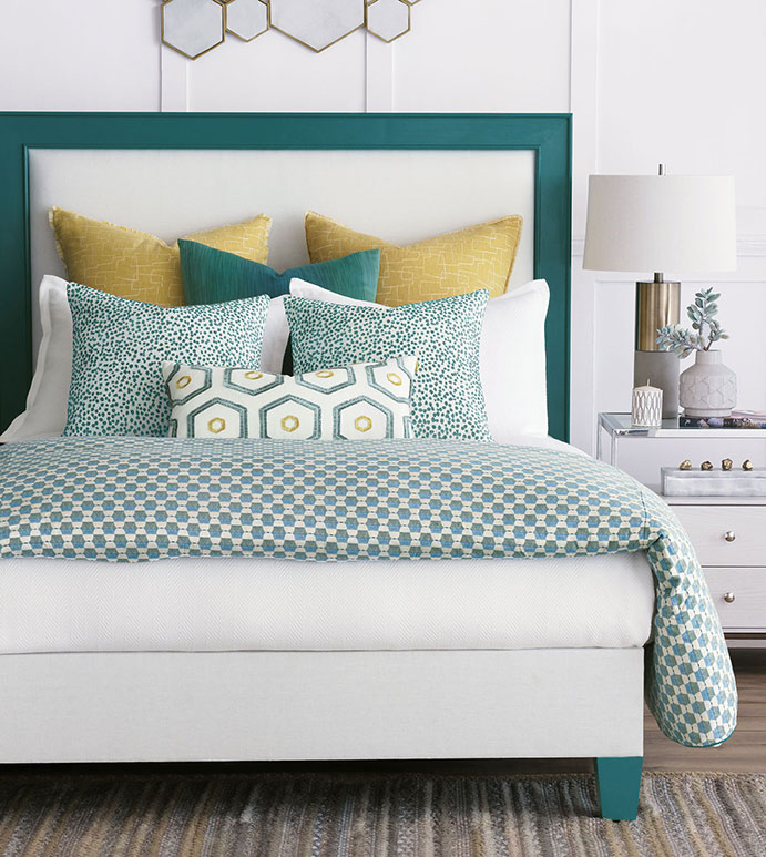 Custom bedding should come with a custom headboard too like in this beautiful green.