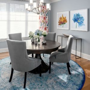 Both floral draperies and floral art adorn this Decorating Den Interiors dining room from kathy McGroarty.