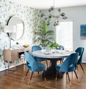 A mid century modern update with lively floral wallpaper.